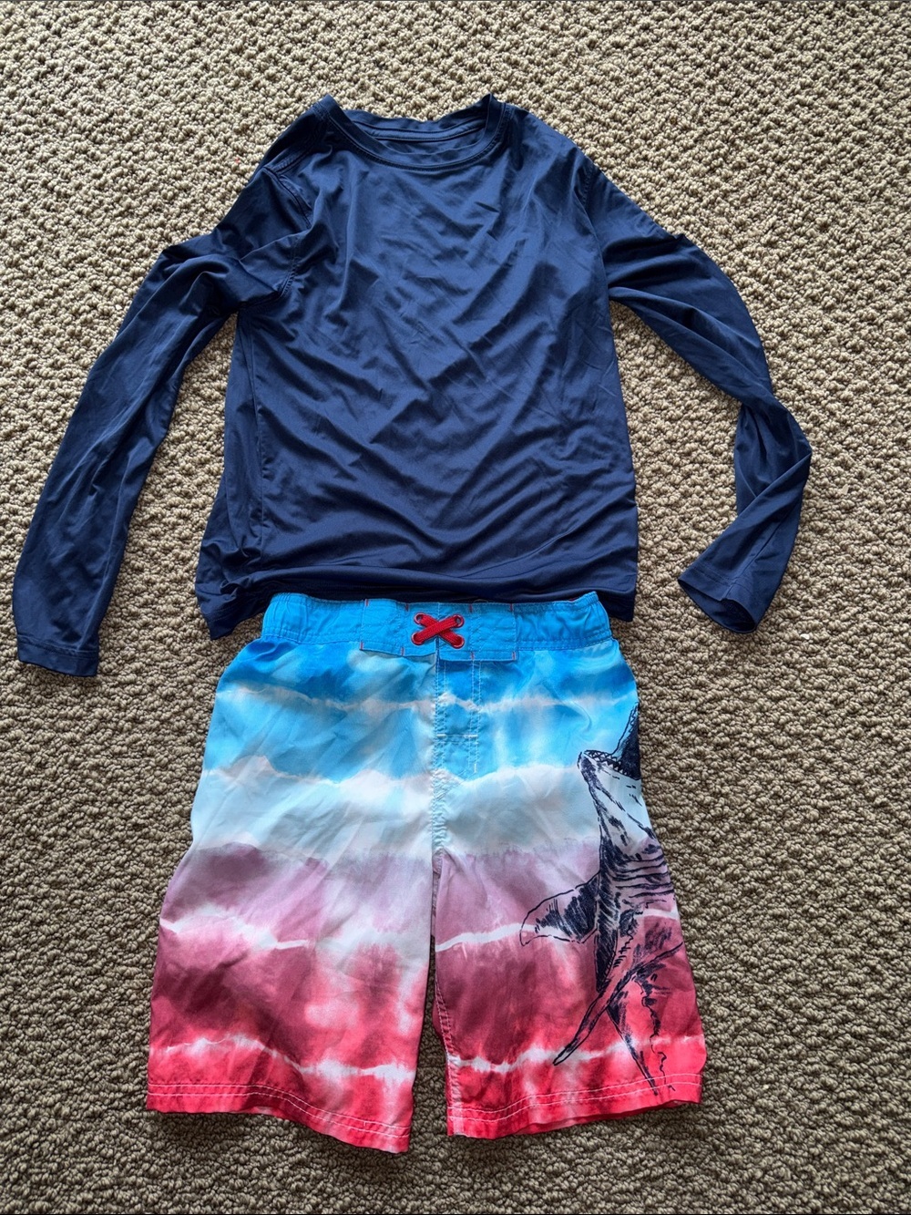 Boys swim Rashguard and board shorts size medium (8/10) like new. Navy top shark